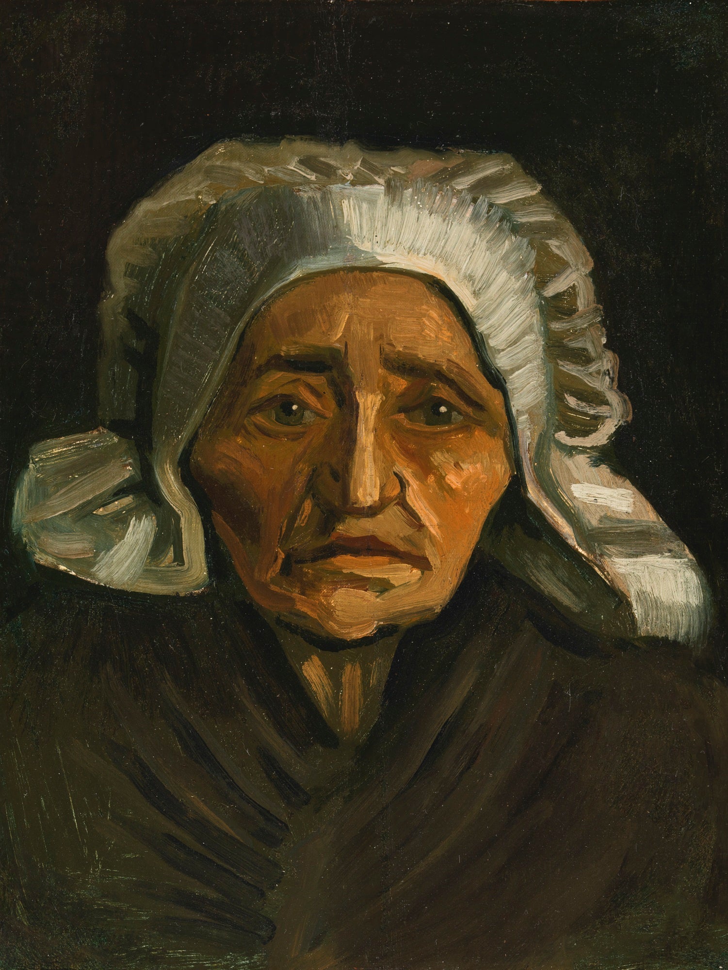 Reproduction du tableau « Tête de paysanne à la coiffe blanche - Vincent van Gogh » par Alpha Reproduction en peinture à l’huile
