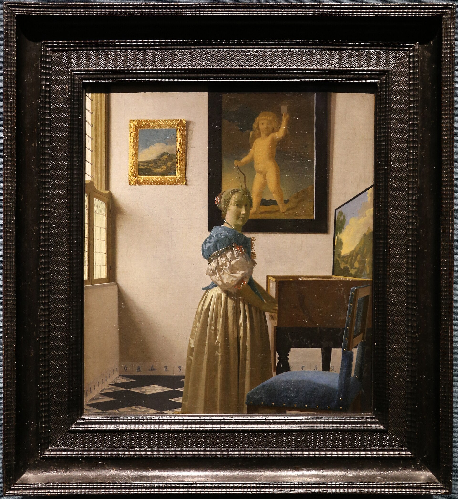 Una donna in piedi al virginale - Johannes Vermeer
