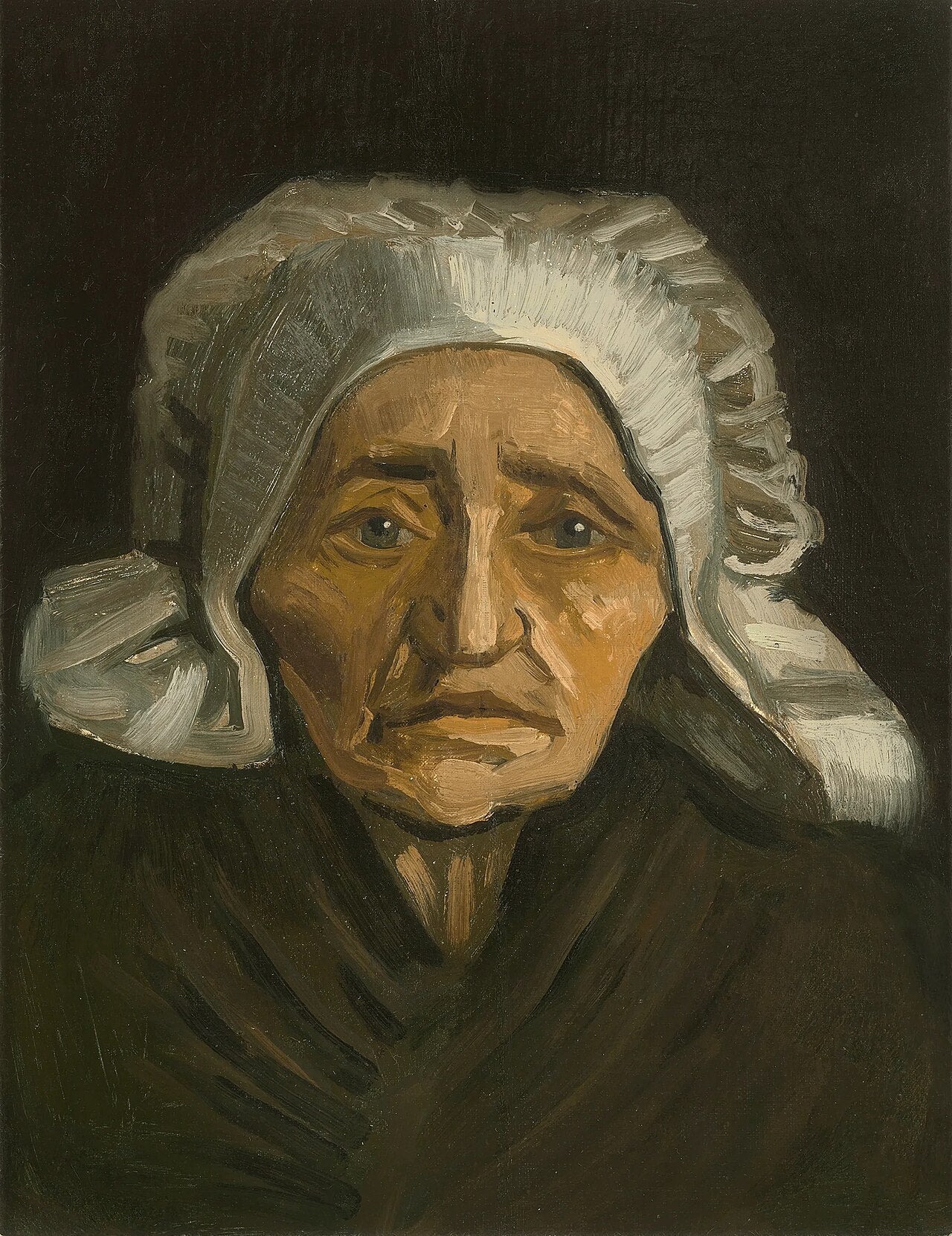 👵 Testa di contadina con cuffia bianca – Vincent van Gogh (1884)