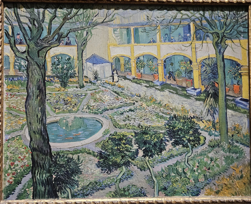 Il cortile dell'ospedale di Arles - Vincent van Gogh
