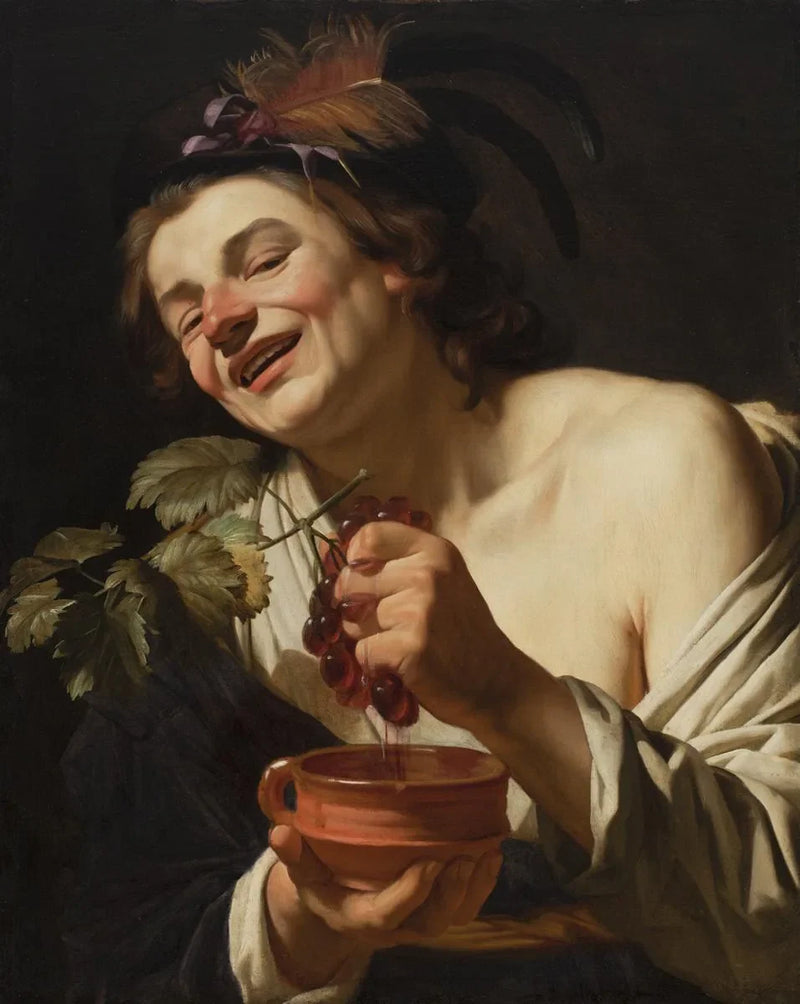 Giovane uomo sorridente che schiaccia l'uva - Gerrit van Honthorst