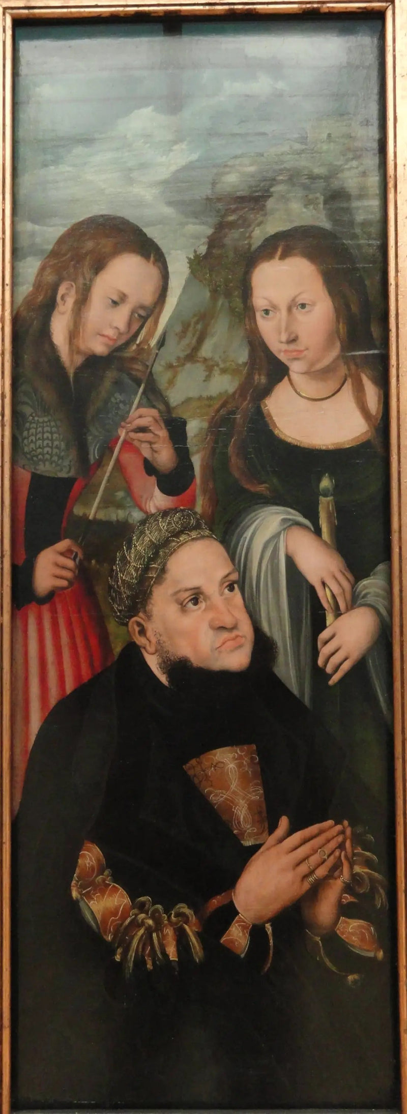 L'électeur Frédéric le Sage de Saxe (1463-1525) avec les saintes Ursule (à gauche) et Geneviève (à droite) - Lucas Cranach l'Ancien