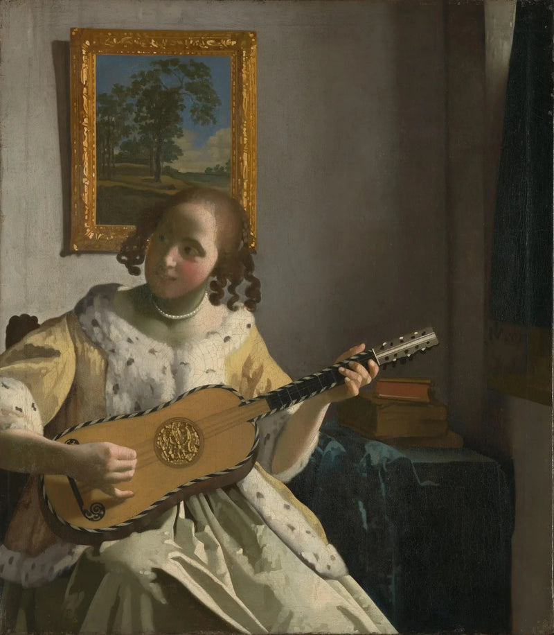 Una donna che suona la chitarra - Johannes Vermeer
