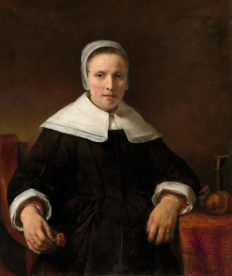 Una donna che tiene una rosa - Rembrandt