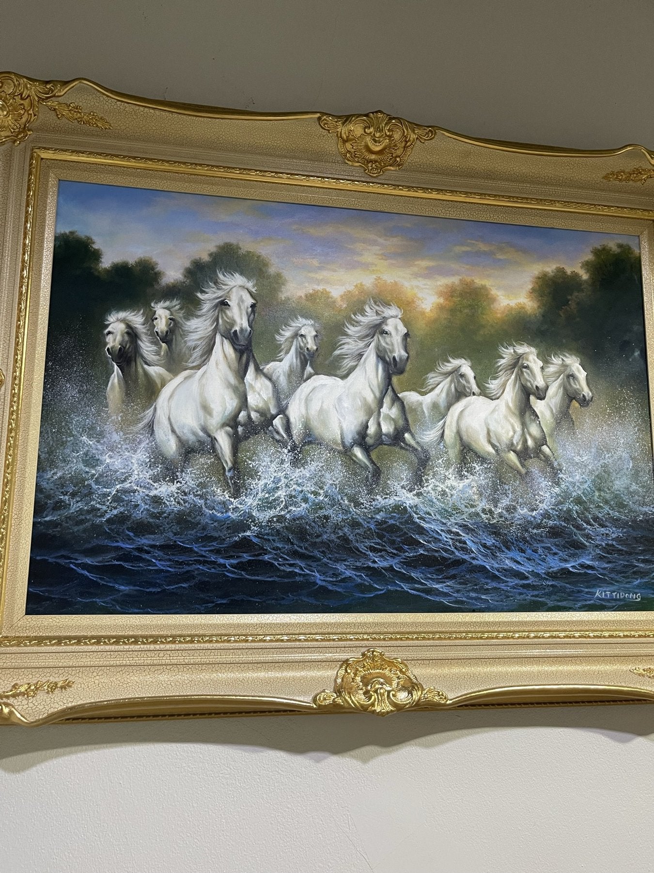 White horses in a gold frame
